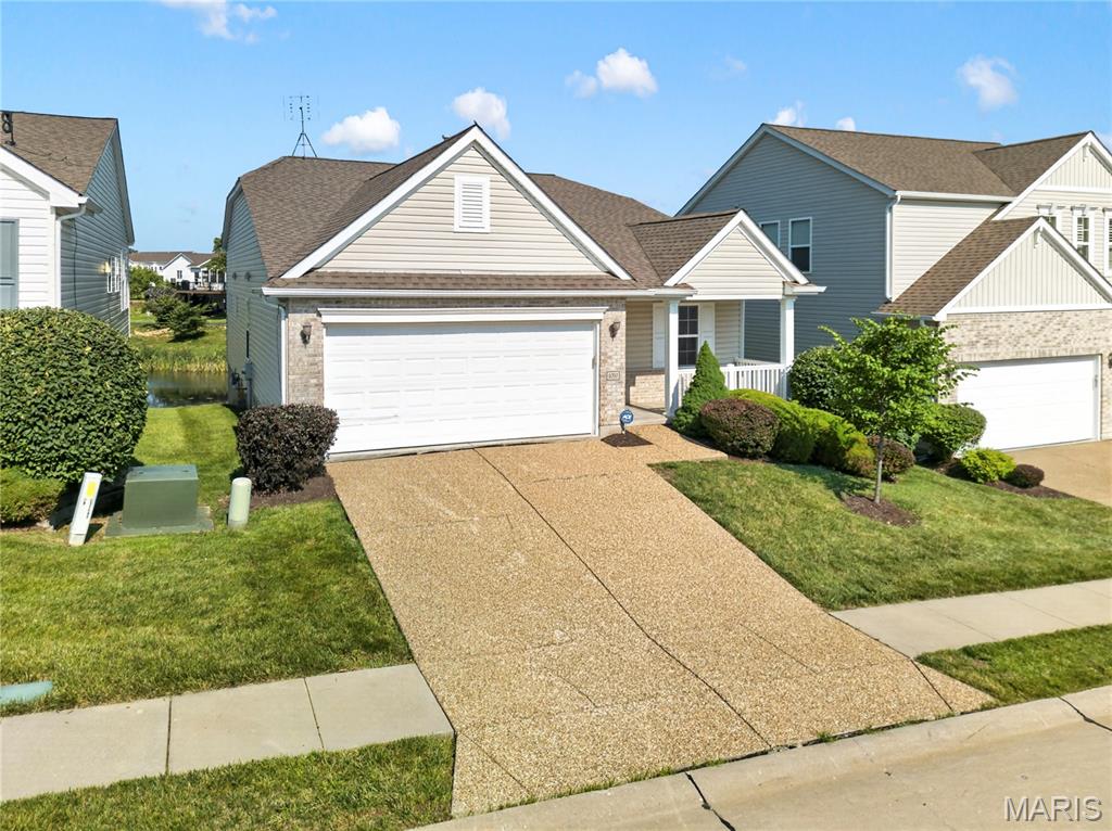 This is one you WILL NOT want to miss!! One of the few villas in the neighborhood with gorgeous views of the pond! Welcome to this three-bedroom ranch villa in the Golf Club of Wentzville! Tucked on a quiet street, meticulously maintained home has everything you've been looking for. Upon entry you'll notice the beautiful finishes in this villa. Soaring 10 foot ceilings carry through the open floor plan from the kitchen & dining area through the living room and Sun Room. The sleek kitchen features 42'' Cabinets with Crown Moulding, custom backsplash, walk in pantry, and large Center Island with seating. The living room/Dining Room area leads to a GORGEOUS SunRoom filled with natural light and 3 walls of windows with views to the pond and walking trail. Your primary bedroom suite is a haven of peace with plenty of natural sunlight featuring a bay window and three transom windows, a large walk-in closet and bathroom with stand-up shower. Two Additional Bedrooms or Den/Office and a Full Bath Complete the main level. Enormous unfinished lower level with a half bath and walk out sliding door access to the pond and walking path. 2 car attached garage with plenty of additional room for toys and tools. Close to highways, restaurants, and amenities. HOA cares for lawn (mowing and irrigation), landscaping, some exterior maintenance, snow removal, pool and clubhouse. Like golf? You're just a short golf cart ride from an amazing course. Like fishing, or just enjoying a body of water? The stocked fish pond in your back yard can be your happy place! Speaking of water, the pool is just five homes away! Schedule your showing today this is definitely one you don't want to miss!!