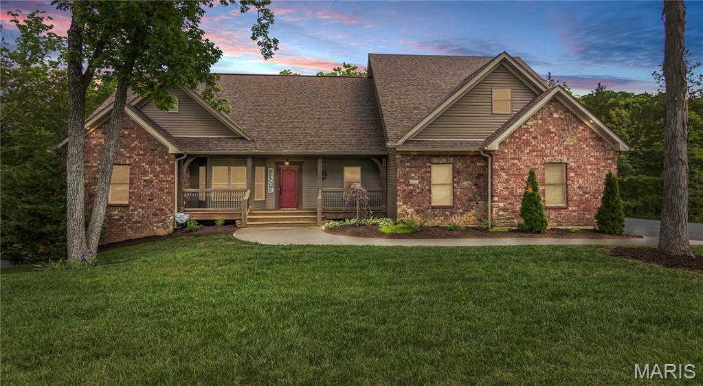 ~OPEN HOUSE Sunday, June 14 from 1pm - 3pm ~ Custom-built masterpiece nestled on a beautiful 1-acre lot in the sought-after The Hollows at Frisco Hill subdivision. This home is offering over 4,800 sq ft of thoughtfully designed living space across three levels. The main floor boasts 2,300 sq ft and features a desirable split bedroom floor plan, hardwood and tile flooring, rich stained trim and doors throughout the entire home, a stunning stone wood-burning fireplace, and a bay window in the dining area. The spacious primary suite features a large 12’x12’ walk-in closet and en-suite with a deep, oversized jetted tub and tiled shower. Two additional guest bedrooms with hardwood flooring, one with a connected full bath and one additional half bath in the hall. The kitchen has beautiful granite countertops, tile backsplash, pull out shelving in the cabinets, and under cabinet lighting. The main floor laundry rounds out the level, along with a large deck perfect for entertaining or soaking in the surroundings. Upstairs, a massive 900 sq ft bonus room with a private office, kitchenette, and full bath offers endless flexibility for a nice rec room, studio, or teen suite. The lower level delivers an impressive 1,600 sq ft of beautifully finished space and wows with a private secondary living quarters. It is complete with 9 ft ceilings, luxury vinyl plank flooring, a full kitchen with granite countertops, electric fireplace in the living room, a bedroom, full bath with jetted tub and separate shower, an additional half bath, and its own dedicated laundry room and 1 car oversized attached garage, perfect for family, guests, or anyone seeking complete independence. Step outside to the lower-level deck for additional outdoor living. Car enthusiasts will love the SIX-car garage package: a fully insulated 3-car attached garage with 8 ft tall doors, a massive 30x40 detached garage with a 9 ft tall door and 100 amp service, and an oversized 1-car attached lower-level garage (has direct access inside the home). The home's systems are equally impressive, featuring a 5-ton zoned heat pump, LED lighting throughout, and a whole house water filtration system.  Additional highlights include 2x6 exterior construction, 400 amp service (two 200 amp panels), two 50-gallon water heaters, new roof on the house and detached garage (Sept 2025), and Anderson windows throughout. This one truly has it all!