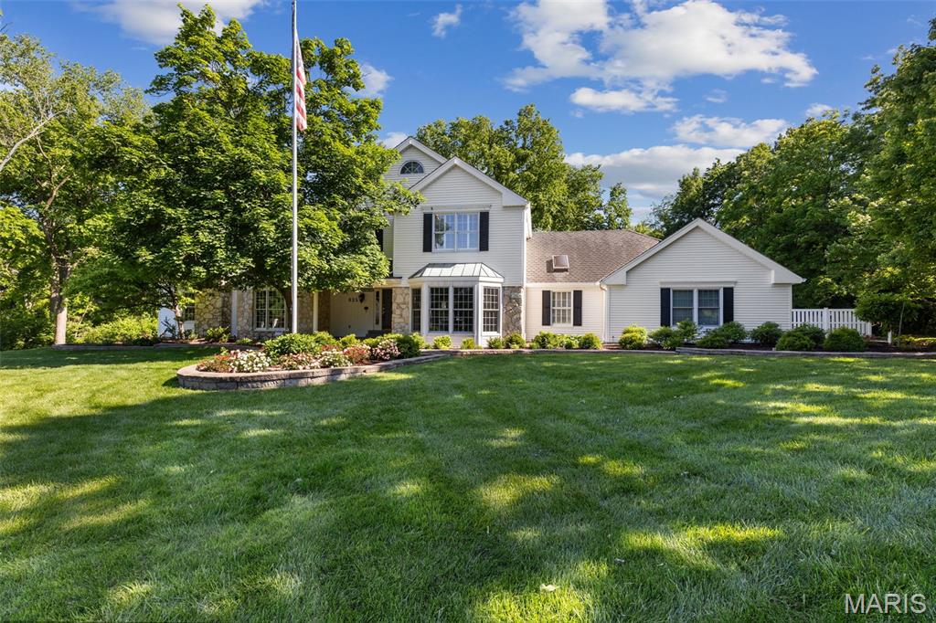 Tucked away on a private, wooded acre+ lot in sought-after Parkway West School District, this impeccably maintained 1.5-story home offers 4600 +/- ft of exceptional living space. Featuring 5 bedrooms, 4 full and 1 half baths, this home blends timeless elegance with thoughtful updates throughout.
The inviting main level includes a spacious primary suite with a beautifully renovated spa-like bath, along with a study, den, formal dining room, and an elegant sitting room perfect for a home office or formal living space. A dramatic entry foyer leads into the expansive great room, while the renovated kitchen features custom finishes, a breakfast area, and opens seamlessly to a bright sunroom overlooking the private backyard oasis.
Upstairs baths have also been fully renovated, offering updated style and comfort throughout the home. With three fireplaces, main floor laundry, and a 3-car garage, every detail has been carefully considered.
The finished walkout lower level adds approximately 2,800 additional sq. ft and includes a full bath, workout room, cedar closet, and abundant flexible living space ideal for a recreation room, family room, guest or sleeping area, and entertaining.
Outdoor living is equally impressive with a deck/patio area leading down to the patio and pool area, surrounded by mature trees for exceptional privacy. A rare opportunity offering space, updates, and private-style living in one of the area’s most desirable locations.