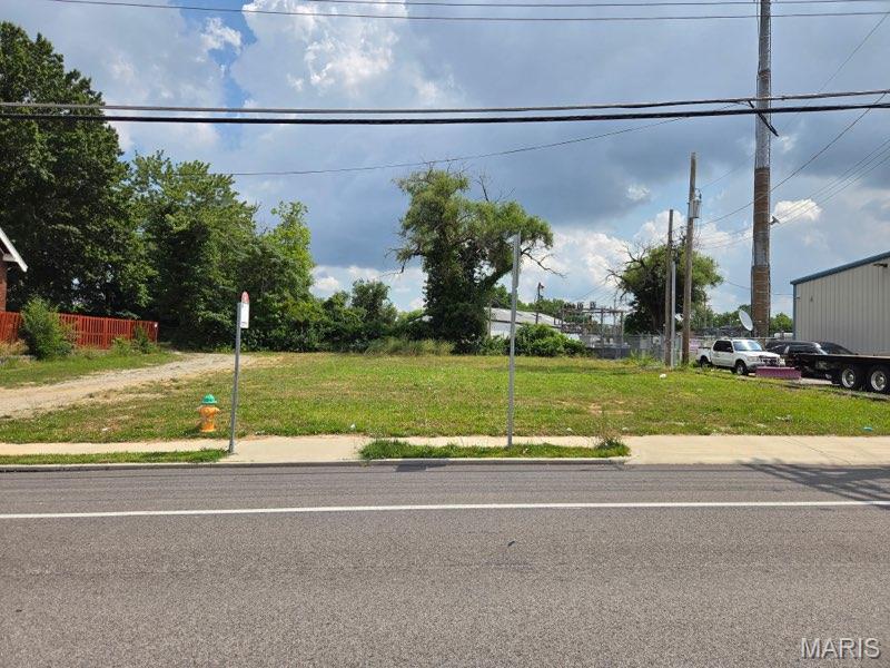 Commercial redevelopment opportunity along the highly traveled Natural Bridge Road corridor! Located at 8639 Natural Bridge, this approximately 0.264-acre (11,500 SF) vacant lot offers 97 feet of frontage and excellent visibility, with more than 16,000 vehicles passing the site daily. Previously improved with a commercial building that operated as a laundromat, the building has since been demolished and utilities are capped at the site. The property is located within the City of Bel-Ridge and was previously identified with 5F commercial zoning, offering potential for a variety of commercial uses and redevelopment opportunities. Conveniently located near I-70, Lambert International Airport, UMSL, and surrounding residential and commercial areas, this site provides strong accessibility and exposure for a future retail, service, office, or other commercial concept. Buyer to verify current zoning, permitted uses, utilities, traffic counts, and development requirements. Drive by today and explore the possibilities!