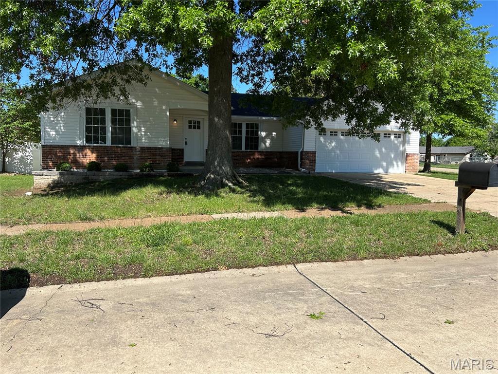 So excited for you to come and see this move-in ready gem!  New carpet in bedrooms, interior freshly painted, both baths updated AND the kitchen is WOW!!  New stainless steel appliances including refrigerator!  Granite counter tops, GAS range, microwave and dishwasher, and big breakfast bar.  You sooo will not be disappointed!!  Full basement with rough-in for bath - not finished so you can have a project!  2 car garage and sitting just right on a corner lot!  Oh bonus!  Screened in porch 26x13!!
