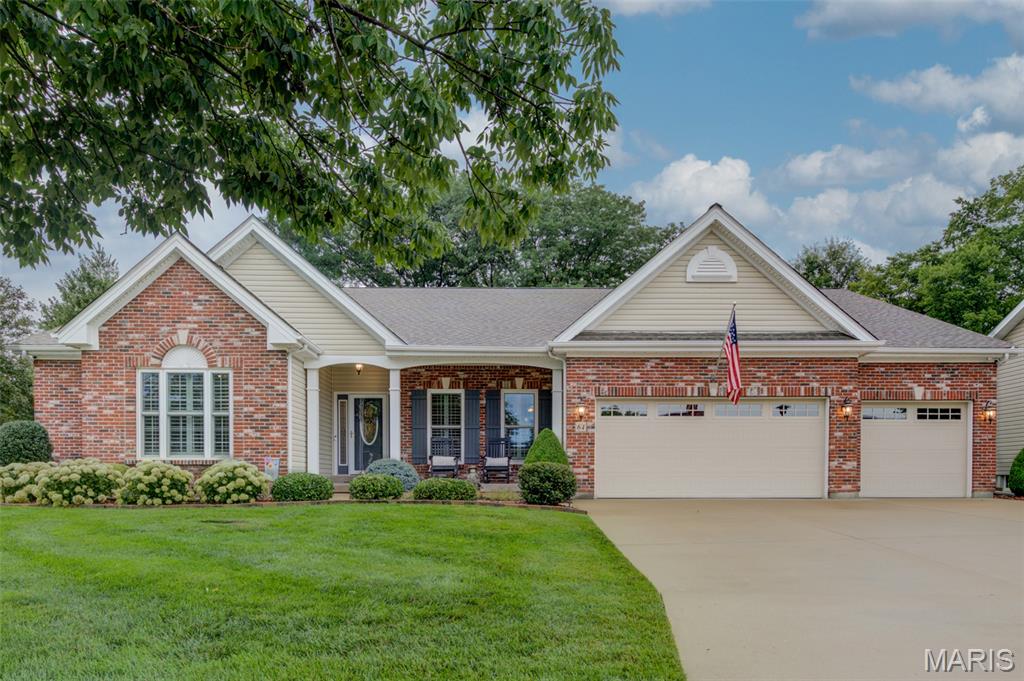 Proudly offered by the original owners, this exceptional home has been lovingly maintained and thoughtfully updated since they custom-built it. Their attention to detail and pride of ownership are evident throughout every room.

The welcoming floor plan features soaring 12-foot ceilings, beautiful custom oak hardwood flooring with cherry inlay, expansive transom windows that fill the home with natural light, and a stunning see-through gas fireplace shared between the great room and family kitchen. The kitchen offers custom-built-in cabinetry with a wine rack and glass storage, while the adjacent living spaces are designed for both everyday comfort and entertaining.

The luxurious primary suite features a beautifully remodeled spa-like bathroom and a custom closet organization system. The updated powder room and Jack-and-Jill bath provide stylish finishes and modern convenience.

The finished lower level expands the living space with a spacious family room, flex room, playroom, and half bath, offering endless possibilities for recreation, hobbies, or guests.

Step outside to enjoy the maintenance-free 12' x 16' screened porch with soaring ceilings overlooking the beautifully landscaped backyard. A paver patio for your fire pit creates the perfect setting for relaxing evenings or entertaining family and friends.

This home is loaded with premium upgrades, including a Lutron whole-home lighting system, motorized Lutron window shades, a Wi-Fi-enabled sprinkler system, Speakercraft in-ceiling speakers, custom built-in bookcases with LED lighting, upgraded ProVia windows, a high-efficiency two-stage Trane HVAC system with a Wi-Fi thermostat, a newer water heater, GE stainless steel double oven range and microwave, Bosch 800 Series dishwasher, and permanent Gemstone holiday lighting.

The finished garage adds additional functionality, and the Caldera Martinique hot tub is available for purchase separately.

Just as impressive as the home itself is the neighborhood. The sellers have loved the peaceful setting, the quiet streets, and the wonderful neighbors who have made this community such a special place to call home.