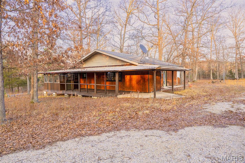 Homesteaders and Outdoor enthusiasts!!!! Look at this opportunity to grab an off-grid cabin with Solar Panels and batteries to power your hunting cabin or minimalist lifestyle situated on 6.64 m/l unrestricted acres. This cabin has been remodeled on the inside and is ready for a new owner, featuring 3 bedrooms and one full bath with well and septic and fully powered by the solar set up. Solar power and completely off grid set up just a little too extreme? Home was previously attached to the grid and could be reattached in the future as well. There are a few things left to be completed but that will be up to you to make it what you want and make it your home. Does this fit what you are looking for? Set up your showings while you can.