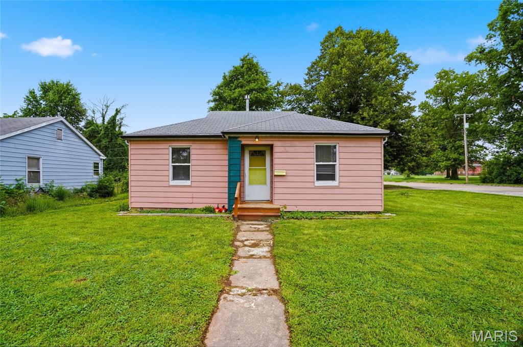 Charming 2-bedroom, 1-bath home situated on a spacious corner lot with plenty of potential! This single-story home offers a functional layout with a bright living area, eat-in kitchen, and abundant natural light throughout. Whether you’re a first-time buyer looking to build equity, an investor searching for your next project, or someone ready to add your own personal touches, this property presents a great opportunity. Additional features include off-street driveway parking and a level yard with space for outdoor entertaining or gardening. Located in the Mexico School District and just minutes from local parks, shopping, dining, and everyday amenities, this home offers small-town charm with easy access to everything you need. Shelving unit in the kitchen, washer, and dryer are excluded from the sale. Seller is offering a $3,300 credit at closing for roof replacement.