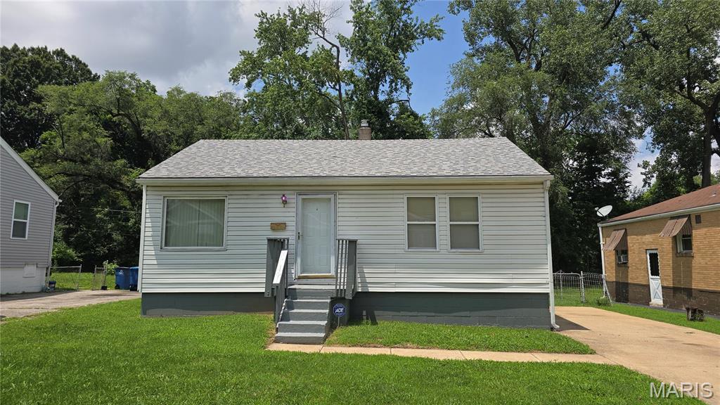 Welcome home to this charming 2-bedroom, 1-bath property offering beautiful wood floors and a spacious level lot. The walk-out basement provides excellent storage or future finishing potential, adding even more value to this home. Whether you're a first-time homebuyer looking for an affordable place to call your own or an investor seeking a solid opportunity, this property checks all the boxes. Conveniently located near public transportation and major highways, commuting is quick and easy. Don't miss your chance to own this versatile property with endless potential!