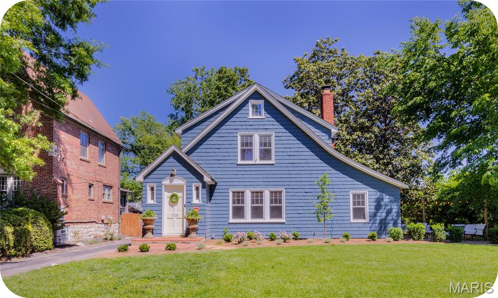 Storybook charm meets timeless character in this enchanting 3-bedroom home that sits on a huge corner lot in the heart of Webster Groves! Location is key here with quick hwy access and just a short jaunt to so much Webster has to offer---Perennial on Lockwood, O+O, Madrina, Clover & The Bee, Telva at The Ridge & so much more!! From the moment you arrive, you’ll fall in love with the cottage-style curb appeal, original hardwood floors, custom built-ins, and warm character throughout. The bright and beautiful custom kitchen features abundant cabinetry, thoughtful updates, and the perfect blend of charm and functionality. A flexible main-floor bedroom has lots possibilities for a home office, playroom, guest space, or cozy den. Upstairs, you’ll find two spacious bedrooms with incredible custom closet storage and a large tastefully updated bathroom...just look at that antique linen cabinet! The whole home is filled with natural light, unique details, and inviting spaces inside and out. The original character is beautiful but this home also has loads of updates including updated plumbing, electric and many new windows! This is truly a Webster Groves gem!