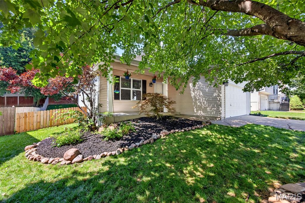 Welcome home to this beautifully updated move in ready 3 bed, 3 bath ranch! With 1,600 sq ft of living space, 1281 Harvest Ridge offers a combination of practical living and recent updates, in a desirable St. Charles location. Conveniently located near shopping, dining, parks, Katie Trail, major commuter routes, and within walking distance to Harvest Ridge Elementary.
From the moment you arrive, you’ll love the inviting curb appeal, fresh landscaping, covered front porch, and spacious yard. 
Step inside to find beautiful LVP flooring and a spacious living room ready for you to mount your TV and stream your favorite show. The remodeled kitchen features shaker-style cabinetry, stainless steel appliances, tile backsplash, luxury vinyl plank flooring, and a spacious peninsula with seating. 3 bedrooms and 2 full bathrooms including a spacious master suite with his and her closets complete the main level.
The partially finished basement featuring a ventless double-sided fireplace, expands the home's usable space and includes an additional full bathroom, offering flexibility for a recreation room, family room, workout area, or hobby space. All this AND a large storage area. 
Step outside to enjoy the large fenced backyard complete with patio space that’s ready for your summer BBQs, entertaining, or simply unwinding.
Additional features include a 2-car garage with ample storage. 
Recent updates include a new Ruud high efficiency furnace 2021, kitchen renovation and flooring 2023, basement bathroom renovated 2024. The sellers have done the heavy lifting for you so you can move right in and enjoy life.