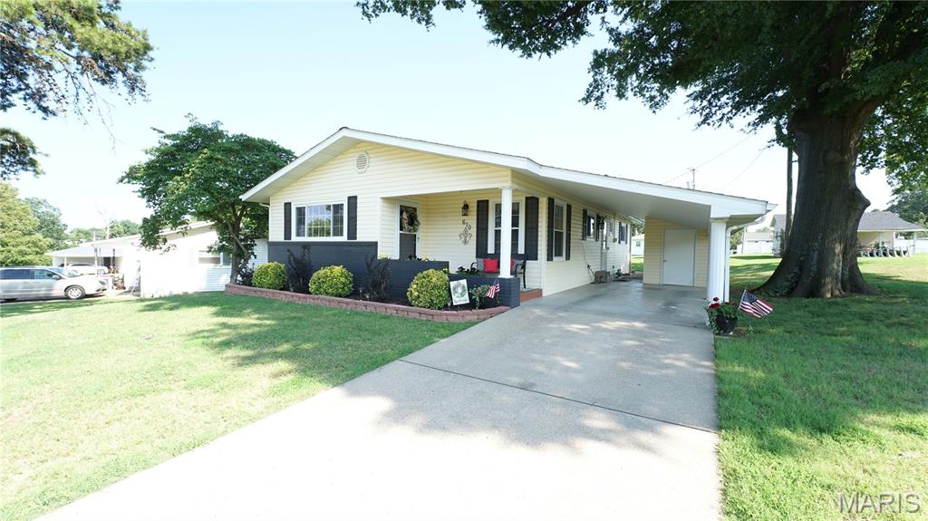 Welcome home to this well-maintained 3-bedroom, 1-bath home located in the heart of Dexter, just a short walk from the Keller Public Library! Offering comfort, character, and thoughtful updates, this property is ready for its next owner. Inside, you’ll find beautifully refinished original hardwood floors throughout most of the home, with carpet in the bedrooms (original hardwood underneath). The kitchen features custom cabinetry, a built-in pantry, and all kitchen appliances will stay with the home. Crown molding throughout adds a touch of charm, while the updated bathroom showcases a beautiful tile walk-in shower. Additional updates include vinyl replacement windows, a roof which is only 4 years old, and central heat and air for year-round comfort. Step outside to enjoy the private backyard featuring a stone patio, vinyl privacy fence, alley access, and a detached storage shed. The attached one-car carport also includes a built-in storage room, providing plenty of space for tools, lawn equipment, or seasonal storage. If you’re looking for a move-in ready home in a great Dexter location with timeless character and practical updates, this one is must-see. Schedule your private showing today!