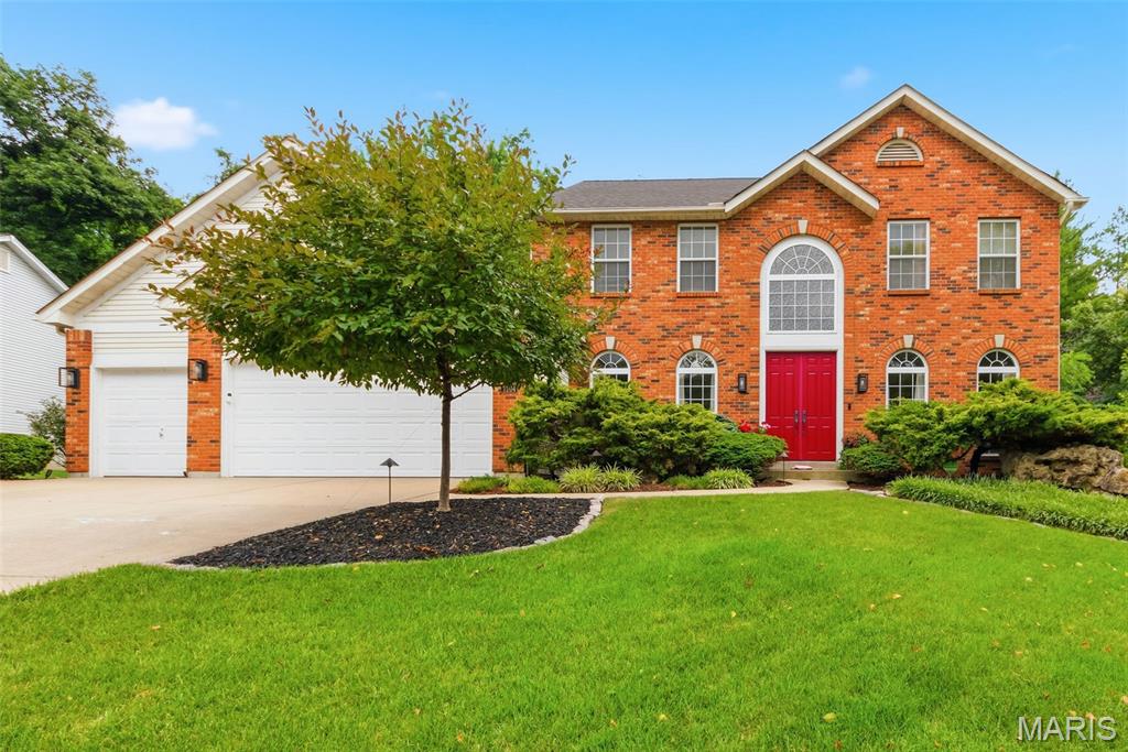 Welcome to this stunning 4-bedroom, 3.5-bath traditional home nestled on a private .38-acre wooded lot in desirable Dardenne Prairie! A dramatic 2-story entrance foyer sets the tone for the open, airy floorplan with an effortless flow. A formal living room (or office) sits in the front of the home and on the other side of the elegant stairs is the formal dining room with an impressive trayed ceiling. 

Gather around the gas log fireplace, flanked with built-in bookshelves in the huge family room with crown molding. The family room is open to the breakfast nook and updated kitchen. It shines with stainless steel appliances and center island - great layout for entertaining, with access to the spacious paver patio where you can enjoy the peaceful, park-like, wooded surroundings. A laundry room, dedicated storage room, and powder room complete the main level. 

Upstairs, the generous owner's suite has a trayed ceiling and walk-in closets. The bathroom has separate vanities—providing plenty of room to get ready, jetted tub, separate shower, and a skylight. Three more bedrooms, one with French doors, plus another full bathroom round out the second floor. 

The partially finished basement offers an incredible rec room with wet bar, + office, full bath, and storage. A  3-car attached garage completes this exceptional home that checks every box. Just 1 mile (10 minute walk) to Barathaven Park with 15 acre lake and 3 miles of trails and minutes to HWY 64 for easy commuting. Don't miss your opportunity to own this Dardenne Prairie gem in the Francis Howell school district!