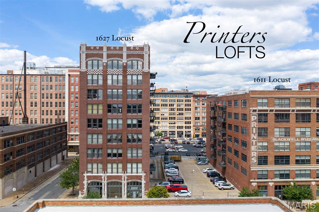 Located in the sought-after Printers Lofts in the heart of Downtown West, this expansive loft offers over 2,000 square feet of authentic industrial style blended with modern comfort and unbeatable city access. Soaring ceilings, exposed interior brick, polished concrete floors, and oversized open living spaces create the true loft atmosphere buyers crave. The generously sized bedrooms offer exceptional comfort, including a primary suite with an enormous walk-in closet. Designed for both everyday living and entertaining, the kitchen features a massive center island with extensive storage, while the oversized in-unit laundry room doubles perfectly as a walk-in pantry and additional storage space. A private balcony provides the ideal spot to step outside for fresh air and city views, while the custom-built tavern-style bar creates a one-of-a-kind entertaining space that feels like your favorite neighborhood gathering spot. Residents also enjoy access to a fitness room, community rooftop deck with stunning views of the Gateway Arch, private additional storage and secure underground parking. Step outside your door and experience true urban living—award-winning restaurants, St. Louis Union Station, Enterprise Center, and CITYPARK are all just moments away. Directly across the street, the stylish 21c Museum Hotel St. Louis brings even more energy to the neighborhood with acclaimed dining at Idol Wolf and coffee from Good Press. This is downtown loft living at its absolute best.