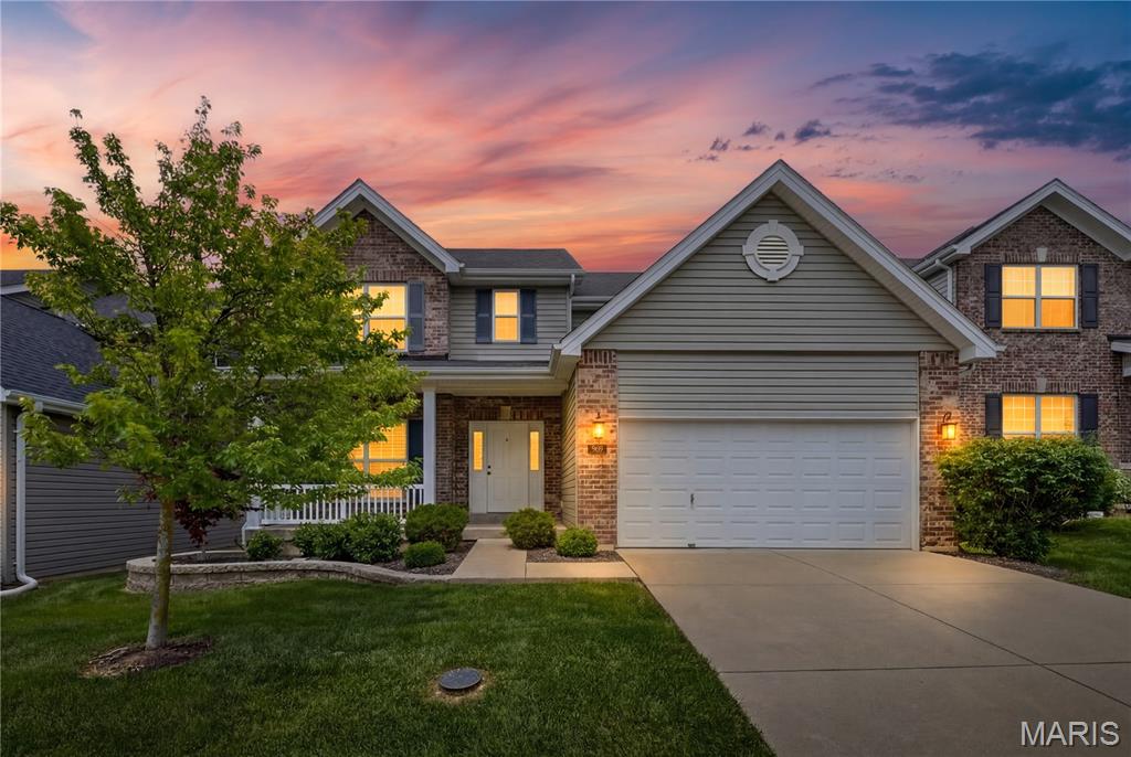 Beautiful 2-story home located in the prestigious Arbors at Meramec Bluffs. This stunning home features wood flooring, plantation shutters, elegant archways, recessed lighting, and updated light fixtures throughout. The sun-filledgreat room offers a cozy gas fireplace and flows seamlessly into the spacious kitchen featuring a center island, granite countertops, custom white cabinetry, and 3-year-young stainless steel appliances. The charming 3-window bay breakfast room overlooks the backyard and provides the perfect space for morning coffee or casual dining. Upstairs you'll find 4 spacious bedrooms, each with walk-in closets and newer carpeting. The primary suite includes dual vanities, a soaking tub, and separate shower. Additional features include main floor laundry, zoned heating and cooling, and 6-panel doors throughout. Step outside to the deck overlooking the fully fenced, level backyard-ideal for entertaining, pets, or play. A
newly added patio off the walk-out lower level creates even more outdoor living space to enjoy. The unfinished lower level is roughed in for a bath and ready for your personal finishing touches. Enjoy subdivision amenities including walking trails and a lake, all just minutes from Castlewood State Park. This exceptional home offers the perfect combination of elegance, comfort, and thoughtfully updated living spaces in a truly gorgeous setting.