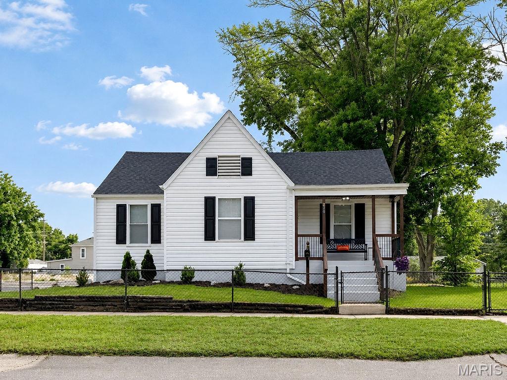 Enjoy your morning coffee or evening beverages on the charming, covered front porch of this delightful 3-bedroom, 1-bath bungalow! Situated on a desirable corner lot in the heart of De Soto. This beautifully updated 1,208 sq. ft. home perfectly blends cozy character with modern updates. Step inside to find an inviting interior featuring a stunning chef's kitchen complete with quartz counters and Carrara backsplash, luxury vinyl flooring, and a beautifully remodeled main-floor bathroom. The flexible floor plan includes an upper-level retreat LOFT bedroom complete with its own dedicated office/play area—perfect for the kiddos. Outside, the massive yard is partially fenced (chain link), offering a fantastic space for play or pets. Best of all, you are within walking distance to historic De Soto Main Street, local restaurants, businesses, and the historic movie theater. Truly a must-see home!