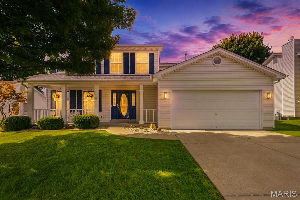 Welcome to this beautifully updated 4-bedroom, 2.5-bath two-story home located in the highly sought-after Francis Howell School District! Thoughtfully designed with stylish updates and functional living spaces throughout, this home is ready to impress.
The updated kitchen features soft-close cabinetry and drawers, gorgeous quartz countertops, a tile backsplash, slate-gray appliances, and a breakfast bar with convenient built-in power—perfect for your stand mixer while baking favorite recipes, creating a work station, or keeping devices charged while entertaining guests. An arched opening leads into the inviting living room, where a gas fireplace creates the perfect gathering space.
The main floor also offers a separate dining room and a home office featuring a stunning wall of built-in bookshelves, creating the ideal space for working from home, studying, or displaying your favorite books and decor.
Upstairs, newly installed wainscoting and 4.25-inch baseboards add character and charm throughout the hallway. The spacious primary suite showcases a striking feature wall, vaulted ceiling accented with a decorative wood beam, and a private en-suite bath complete with dual sinks, vanity seating, and a generous 6x5 walk-in closet. Three additional bedrooms provide plenty of space. The waterproof laminate flooring on this level was installed in 2024.
The unfinished lower level includes a bathroom rough-in and provides endless possibilities for future expansion, whether you envision additional living space, a home gym, recreation room, workshop, or simply abundant storage.
Step outside from the kitchen onto the newly finished composite deck overlooking the privacy-fenced backyard—an ideal setting for outdoor dining, entertaining, or relaxing evenings under the stars. The garage is equipped with slatwall storage panels, offering excellent organization for tools, lawn equipment, sports gear, and outdoor accessories.
Enjoy peaceful mornings or unwind after a long day on the covered front porch with your favorite cup of coffee. Combining modern updates, thoughtful details, and an excellent location, this home offers the perfect blend of comfort, style, and functionality. Schedule your private showing today and experience everything this exceptional home has to offer!