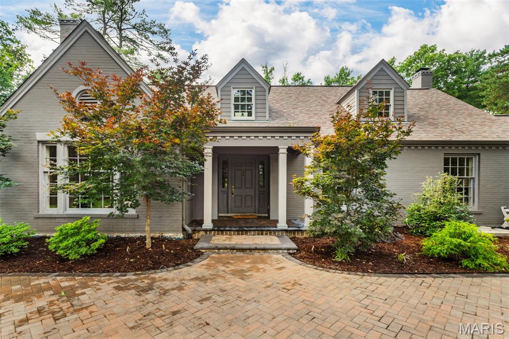 Showings begin 7/14/2026 -Wonderful opportunity to live in your dream home on a wooded lot in Frontenac. Enjoy unlimited entertaining opportunities both inside and out.  Grand entry, library, expansive kitchen and family room that both connect to a sun room with views of the manicured back yard perfect for summer gatherings. Upstairs the large primary bedroom addition with spa like bathroom and kitchenette make this a cozy private hideaway.  At the heart of the home is a stunning expanded kitchen featuring generous workspace, a walk-in pantry, a large eat in space that flows to the surrounding gathering areas. Upstairs, hardwood flooring extends throughout all bedrooms and hallways, complemented by renovated baths and large bedrooms.  The basement awaits your finishing touches,  kitchen space, bath, office or craft space, large laundry room and possible family room. Designed for year-round enjoyment, the backyard offers a true resort-like setting. Multiple seating areas, dining areas and mature landscaping for seasonal interest.  Showings to begin 7/14/26.