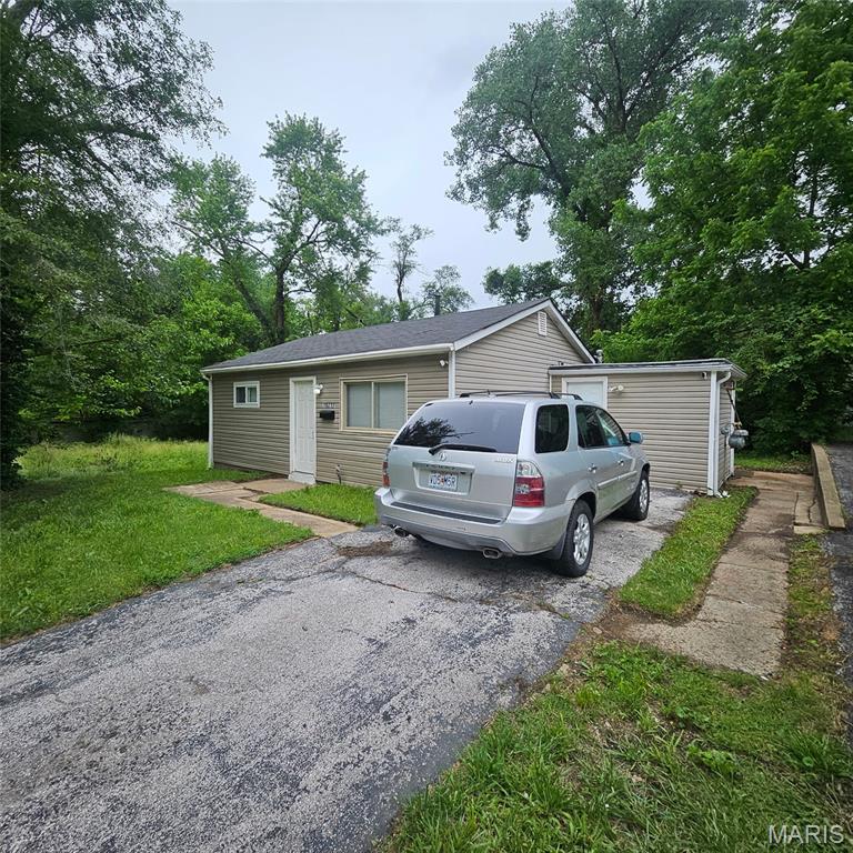 Step into a beautifully renovated piece of St. Louis history at 10212 Duke Dr, St. Louis, MO 63136. Built in 1954, this move-in ready single-family home combines classic charm with extensive modern updates, offering peace of mind knowing nearly everything has already been replaced or upgraded.

Major improvements include brand new underground plumbing, a brand new water line, new electric service outside, a brand new water heater, and a brand new A/C unit. The home also features brand new windows throughout and a roof that is less than 5 years old. The furnace is approximately 10 years old and still working great.

The updated kitchen features granite countertops, a brand new backsplash, and a new sink, giving the space a clean, modern feel while still maintaining the home’s original character. From the mechanical systems to the cosmetic finishes, the expensive updates have already been completed.

This is a rare opportunity to own a thoughtfully updated home with major infrastructure improvements already done. Perfect for an owner-occupant looking for low-maintenance living or an investor seeking a strong turnkey rental opportunity.