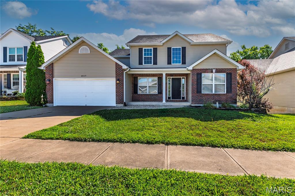 Stop the car—this is the one you've been waiting for! 

With a brand-new roof, brand-new siding, and a floor plan that just makes sense, this home is ready for its next chapter. From the moment you walk in, you'll love the unique dual staircases that add both character and convenience—because one staircase is good, but two is even better.

The heart of the home is the spacious kitchen, featuring abundant cabinet space, a center island, stainless appliances, and room for everyone to gather. Whether you're hosting the holidays, helping with homework, or enjoying a quiet cup of coffee, this space was built for real life.

The main-floor laundry means no hauling baskets up and down stairs, while the oversized living spaces offer plenty of room to spread out, entertain, or simply relax. Upstairs, retreat to the spacious primary suite complete with a walk-in closet, soaking tub, separate shower, and double vanity.

And while the house checks all the boxes, the neighborhood is what really makes it special. Sidewalks throughout, beautiful lake views, and a location that puts you close to everything while still feeling tucked away. It's the kind of place people move into and don't want to leave.

The unfinished lower level offers a blank slate with plenty of room to grow. Whether you're dreaming of a home gym, media room, playroom, additional bedrooms, or the ultimate entertaining space, there's no shortage of possibilities.

Don't miss out!