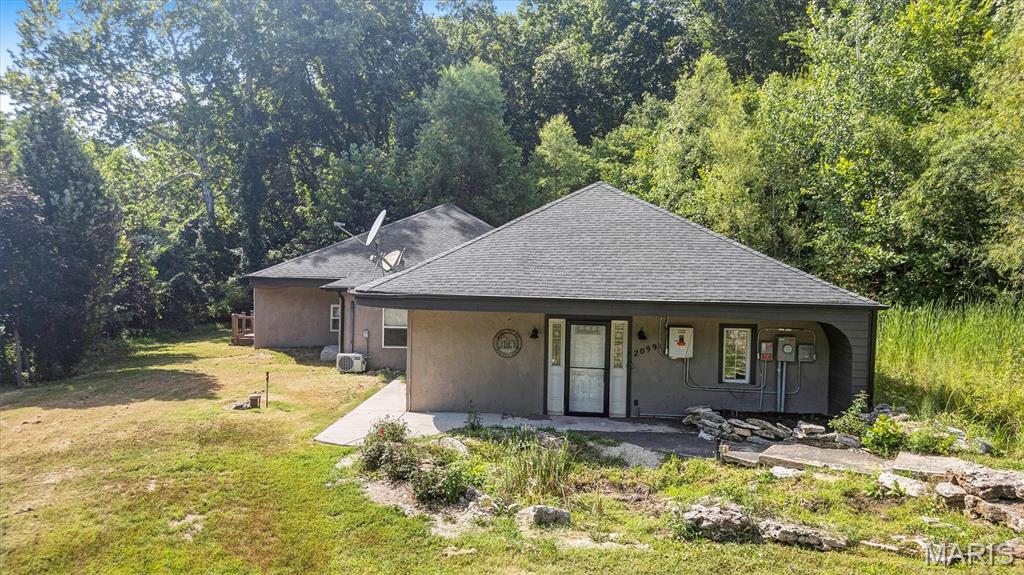 If seclusion and tranquility is what you are searching for look no further! Discover serene beauty in this gorgeous hidden Ranch sitting on almost 11 acres tucked away off your own private street! A beautiful updated kitchen and large great room are the first to greet you as you enter this home. Granite countertops, plenty of cabinet space and stainless steel appliances paired with a MASSIVE island set the standard here. Venture down the hall and notice the first bedroom, a bonus room that could be used as an additional bedroom/office/home gym or play room for the kids and the first fully renovated bathroom. Did we mention Main Floor Laundry?! As you continue down the hall you will discover the HUGE primary bedroom with a walk in closet, private exit to a second back deck and a fully renovated Primary En Suite! Quality was not spared as this bathroom will WOW you! Head on down the pasture and you have a giant enclosed out building perfect for any of your ATV's, Tractor equipment, Project Vehicles or anything else you might have. Throughout the property you will notice various fruit trees- mature and ready to harvest. There is a large multi acre parcel of land that is cleared & level as well as plenty of acreage with trees for seclusion if you would prefer that more. You really have the best of both worlds here. The County even clears the snow in the winter up to the driveway. The Solar Panels and Generate all stay with the new owners! What more could you ask for? Schedule your showing now and come view this Country asset in person!!
