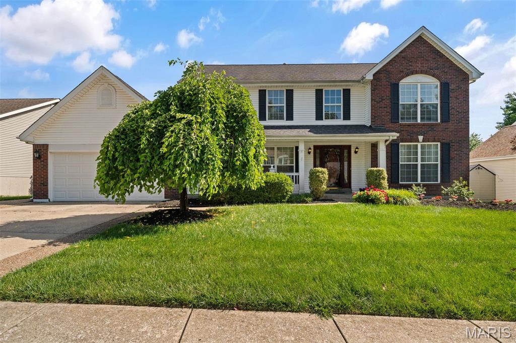Beautiful 27-year-old two-story home situated on a spacious, level, fully fenced lot, featuring an impressive 11' x 16' (approximately) three-season room. From the attractive brick and vinyl exterior and welcoming front porch to the thoughtfully designed interior, this home offers comfort, style, and functionality throughout.

Step inside to a grand two-story foyer with hardwood flooring that leads to a formal dining room accented by elegant columns. The expansive family room provides a cozy gathering space with a gas fireplace, while the well-appointed kitchen boasts a large center island, crisp white cabinetry, a convenient planning desk, and a recently upgraded dishwasher.

The spacious primary suite includes a luxurious private bath, creating the perfect retreat. With four generously sized bedrooms and 2.5 bathrooms, this home offers plenty of space for family living. Ideally located near schools, shopping, and major highways, you'll enjoy both convenience and a desirable neighborhood setting.

Additional features include a bright and inviting sunroom, making this home an exceptional value. Schedule your showing today before this opportunity is gone!