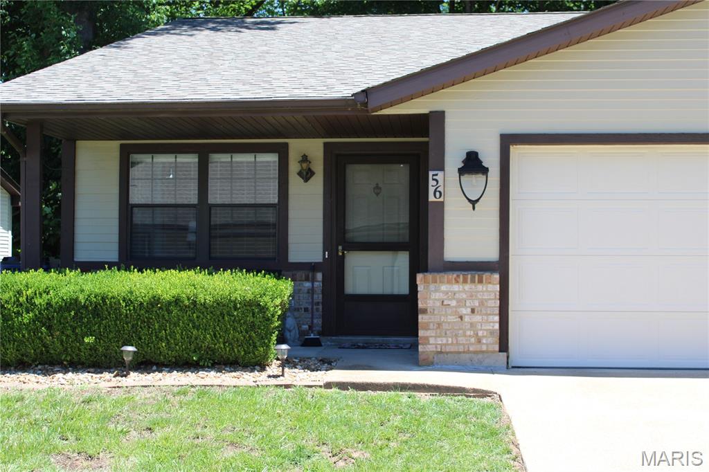 Peaceful and Quiet. This condo sits on the backside of this community allowing lots of privacy, and the sunroom lets you enjoy the outside views and nature all year long! This updated condo has vinyl plank flooring, fresh paint, attached 1 car garage and an additional parking space specifically for this unit, which is a premium feature! All the appliances stay including the washer and dryer. Come make this your tranquil oasis.