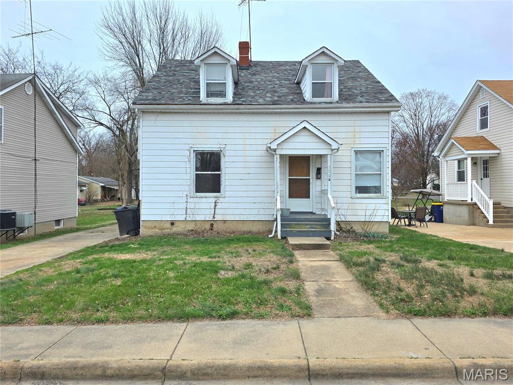 Welcome to this 4-bedroom, 2-bath home offering 1,571 sq ft of versatile living space.  Previously used as a 2-family rental, this could easily be used as a single family residence.  Each level houses 2 bedrooms and full bath as well as an eat-in kitchen.  The upper level also features a family room and main level a spacious living room.  Outside you'll find a 2-car detached garage and nice level lot.  Set your appointment Today! More pictures coming.