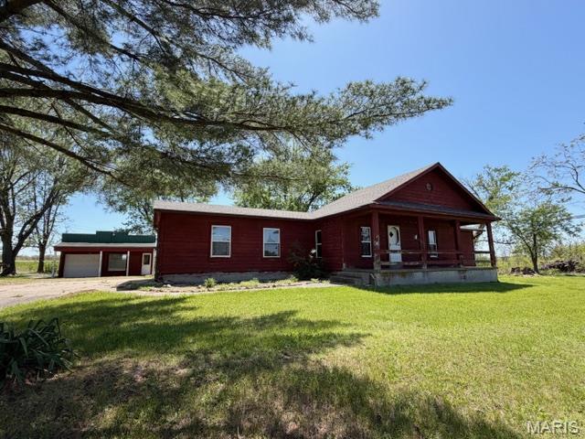 This spacious 1,816 sq ft home offers comfort, functionality and updates throughout.  Featuring 4 bedrooms and 3 full baths, there's plenty of room for family living, guests or a home office setup.
You'll appreciate the many improvements completed in 2020, including new roof, carpet, flooring, electrical box, garage door, countertop and some cabinets, toilet and vanity-giving the home a fresh move-in ready feel.  A split heating and cooling system adds extra comfort and efficiency.  
The property includes an attached 2-car garage plus a detached 2-car workshop-perfect for hobbies, storage or additional workspace.  Enjoy relaxing outdoors on the covered front porch or entertaining on the back patio.
Conveniently located with both Hwy 70 and service road frontage, this property offers excellent accessibility while maintaining comfortable residential feel.  4.38 acres right on Hwy 70.  
Billboards signs have been sold and do Not convey with property.  Billboard owners have easement to maintain signs. 
Don't miss out on this opportunity.