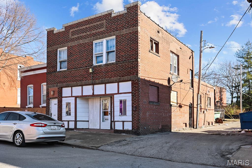 Welcome to 3742 California Avenue, a mixed-use building located in the heart of Gravois Park. This property offers a flexible layout with three occupiable units, including a commercial storefront, a rear studio unit, and a three-bedroom residential unit on the second floor—functioning as a triplex. The building is fully vacant, providing a clear path for renovation and repositioning. Recent improvements include a new rubber roof, new six-inch gutters, five brand-new windows, along with select newer flooring and structural updates including new joists and framing. The property is in need of rehabilitation and presents a strong opportunity for an owner-occupant or investor seeking a mixed-use asset in a South City location with proximity to major corridors, public transit, and neighborhood amenities. A versatile building with multiple use options for the right buyer.