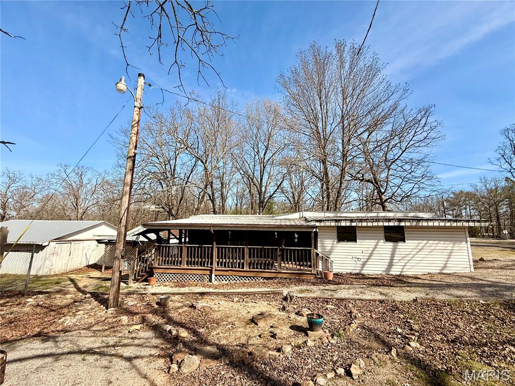 Just minutes from Lake Wappapello, this 2 bedroom, 1 bath manufactured home is a great option for a weekend getaway, investment property, or full-time living.

Sitting on just under 1 acre, the property includes a gravel lot beside and behind the home, offering plenty of space for parking, storage, or future possibilities.

You’ll also find a 3-bay shop with a dirt floor—perfect for storing boats, ATVs, or lake gear.

If you’ve been looking for an affordable place close to the lake with room to spread out, this one is worth a look.