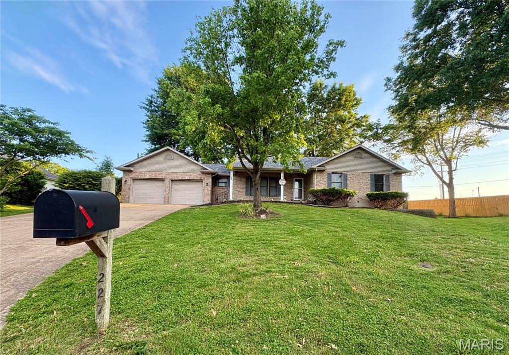 Welcome home to this spacious ranch offering over 2,600 sq ft of living space tucked away in a quiet cul-de-sac! This well maintained 3 bedroom, 3 bathroom home features a fully finished lower level complete with a kitchen/living area and 2 additional sleeping areas-- perfect for guests, extended family or flexible living space. Enjoy peace of mind with a new roof, plus outdoor living made easy with a fenced backyard, mature shade trees, and a 12x17 deck ideal for relaxing or entertaining. The inviting curb appeal and generous living areas makes this home one you won't want to miss!