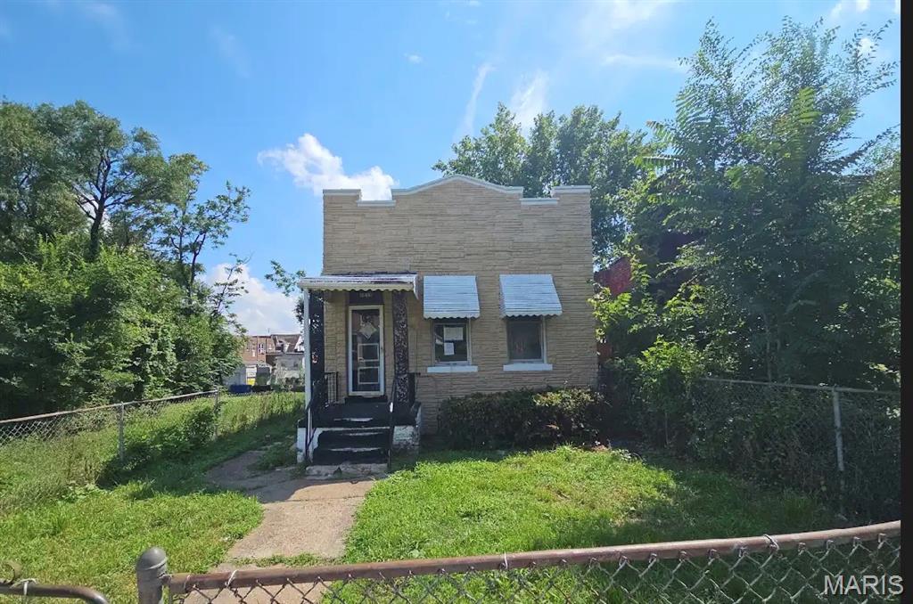 Unlock the potential of this charming bungalow! Featuring a spacious layout and a level yard, this property is full of possibilities for buyers ready to bring their vision to life. This property is offered in its current AS IS condition; all utilities are turned off.