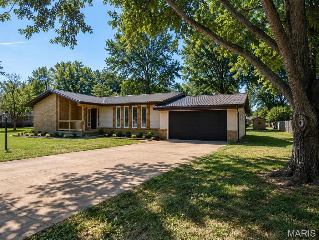 Home with location in a great family neighborhood offering 4 bedrooms and 2.5 bathrooms. So much space inside including an office/bonus room and huge yard outside! Updated throughout with new lighting, fresh interior paint, new flooring throughout, bathroom fixtures, butcher block countertops and more! Outside you will find a new metal roof, large yard, mature trees and 2 storage sheds. Conveniently located close to schools, shopping and local amenities. Move in ready home with LOW TAXES! Call today to view this fantastic property.