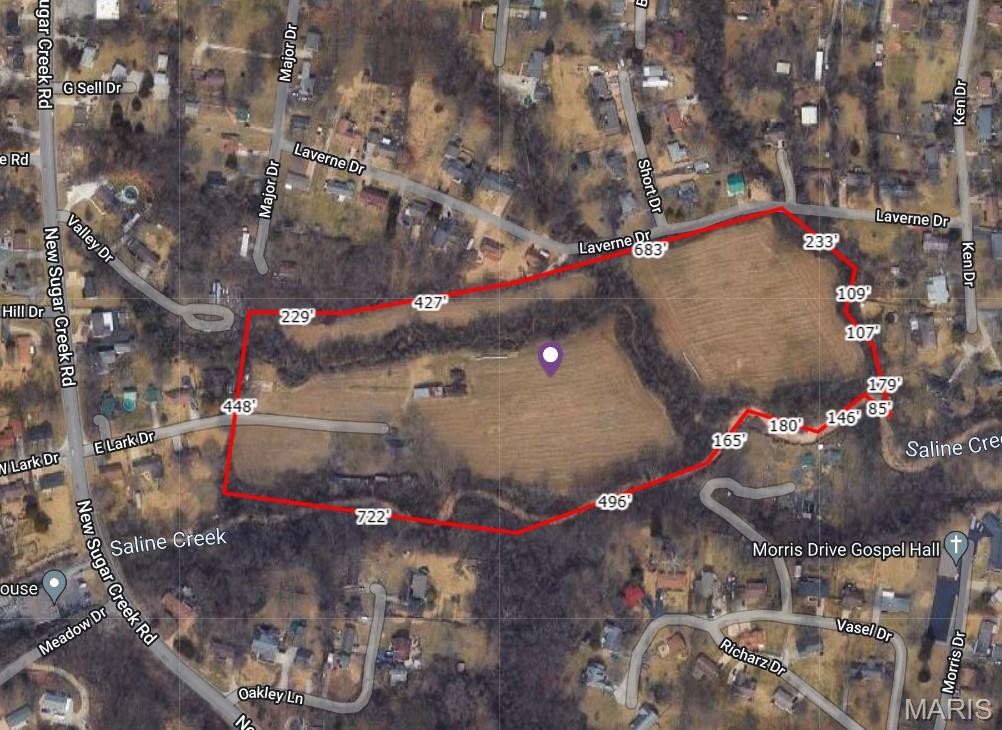 Location, Location, Location!!!  Don't miss out on this 18 +/- acres just off New Sugar Creek and Hwy. 30.  This property has frontage on Saline Creek and a very private setting.  Could be a perfect location for a private retreat/ equine center/ mini farm/ home development/ or so many possibilities.  Currently has a well and septic with an older home that could be revived and several outbuildings, but county water and sewer are very close and accessible.  Home and outbuildings are "AS-IS".  Approximately 15 acres have been used for row crops and/or hay.  Great pastureland if you are looking to start you own stable or mini farm.  So many possibilities on this great level ground.  This is not a drive by, must have a confirmed appointment and agent must accompany all showing.  Please do not drive onto property without appt.  Come take a look today before it is gone, you don't find this flat usable property often in this area.  Builders, this might be the right location to do your next development.