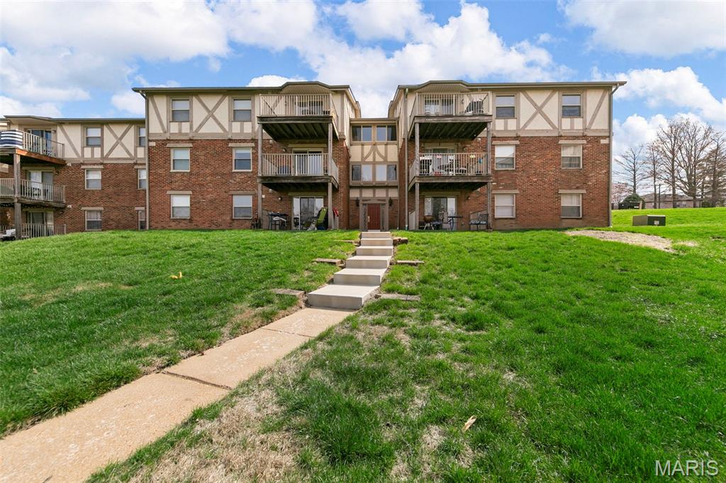 Welcome to this charming 2 bed, 1.5 bath condo featuring a bright, open floor plan. The living room welcomes you with natural light creating a cozy feel. The dining room opens to the kitchen with luxury vinyl plank flooring creating a cohesive flow and a great space to host gatherings. The kitchen showcases stainless steel appliances and a center island creating additional counter space. Enjoy the convenience of the laundry closet located off the kitchen. The primary bedroom features a walk in closet with built in shelving and a full bath creating a perfect retreat after a busy day. A second bedroom and half bath complete this unit. Parking is located right outside the unit. Enjoy the community pool this summer and the great location close to the school, shopping and more!