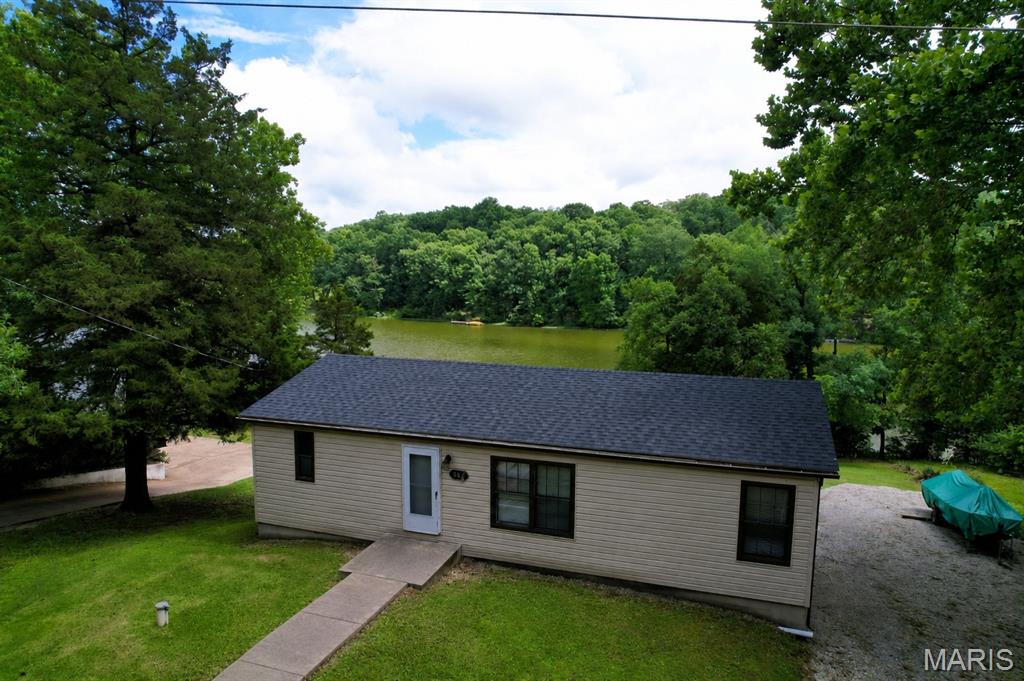 Enjoy lakefront living at its finest with this spacious 3-bedroom, 2.5-bath manufactured home situated on a beautiful 30-acre lake in a quiet, peaceful subdivision. Wake up to stunning water views and spend your days fishing, boating, and enjoying everything lake life has to offer.
The home features a large deck overlooking the backyard and lake, providing the perfect setting for morning coffee or evening sunsets. A private dock offers convenient access to the water right from your backyard.
Inside, you’ll find comfortable living spaces with plenty of room for family and guests. The walkout basement, accessible from an exterior entrance, includes a half bathroom and bar area-ideal for entertaining, hosting gatherings, or creating the ultimate recreation space.
Whether you’re looking for a full-time residence, weekend retreat, or vacation property, this lakefront home offers the perfect combination of relaxation, recreation, and scenic beauty.