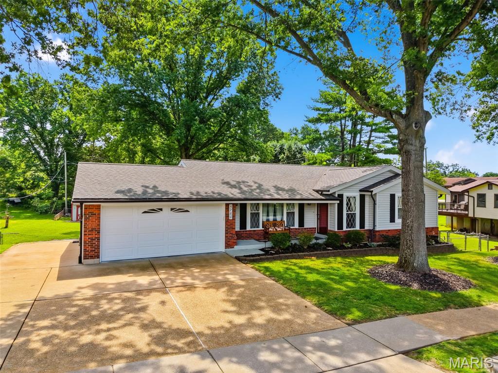 WOW!!! Adorable & Affordable! A MUST SEE!! This one is a show stopper! Main Floor with 3 bedrooms & 2 full updated bathrooms. Large Tasteful Kitchen (mobile island can stay), stainless stl appliances (all can stay), double window over kitchen sink overlooks the covered deck & well manicured fenced yard!  Breakfast/Dining Room can accommodate a larger table & chair set. Finished walk-out lower level with kitchenette (fridge can stay), gaming area, family room, PLUS possible extra bedroom/office. Additionally, 1/2 bath plus lots of storage. Washer/Dryer can stay as well! Steps around side of house provide for a private entry into basement! Covered patio! Shed! Updates! Don't wait on this one!!!
