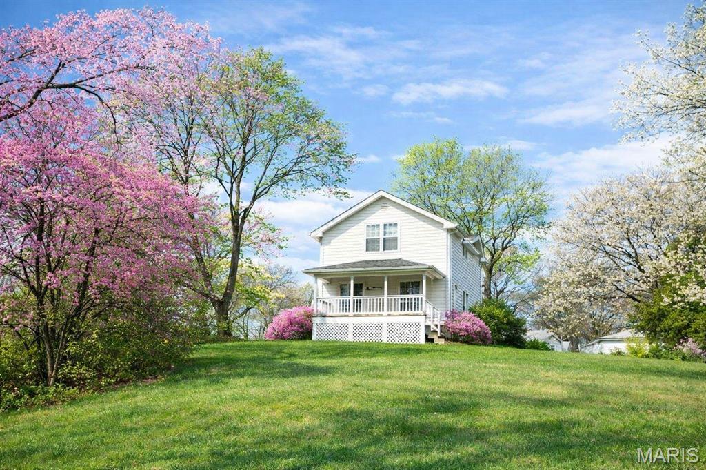 So much potential for this 2-story farmhouse on 2.25 acres.  With a little TLC this home could be offering the perfect balance of country charm and modern comfort. This spacious home features 4 bedrooms 2 baths and a finished lower level, includes a large deck overlooking backyard for all your summer BBQ's. Detached 1 car garage with workshop, additional outbuilding with finished walls and electric, and a newly built 40x40 3 bay garage with 220 electric, offering 1 bay designed for an RV. The extra space could be used for a workshop, or conversion to another living space.  Lots of room to grow, this property delivers privacy, functionality, and endless possibilities with convenient highway access just a few miles from St Louis County. This property could provide rental income.
"OWNERS MOTIVATED TO SELL.