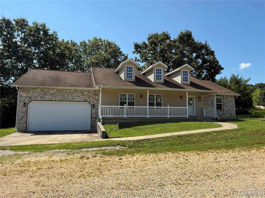 Situated at the end of a quiet street, this single-level ranch offers a functional open floor plan with a gas fireplace in the living room and a split-bedroom layout that provides added privacy. The kitchen includes stainless steel appliances, while the primary suite features an en-suite bathroom with a double vanity, jetted tub, and separate shower.

The home will require numerous cosmetic updates and repairs, presenting an opportunity for buyers looking to add their own personal touches or invest in improvements. With a desirable layout and location, this property has plenty of potential. Schedule your showing today to see the possibilities for yourself.
