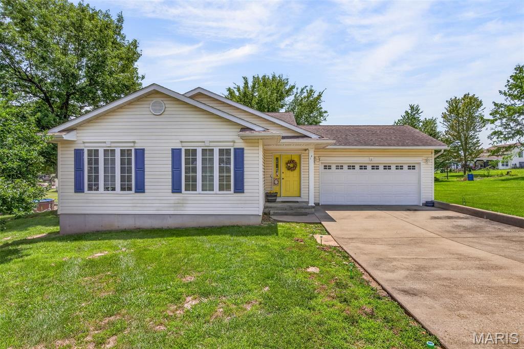 Welcome to this charming tri-level in Hunters Ridge! Built in 2001, this 3-bed, 2-bath home offers 1,603 sq ft of comfortable living space across multiple levels — perfect for families who love room to spread out. Situated on a .40-acre lot, offering plenty of outdoor space to enjoy. The main level features luxury vinyl plank flooring throughout the living, dining, and kitchen areas, while a breakfast bar and pantry make the kitchen both functional and inviting. Downstairs, a walk-out basement adds a bonus room, third bedroom, and second full bath. Enjoy peace of mind with an attached 2-car garage that offers plenty of storage. All of this in the Central R-III school district at an exceptional value. Don't miss your chance — schedule your showing today!