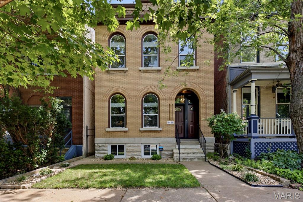 Some homes simply have a story to tell. At 4438 Arco, that story begins in 1896 and continues today with a stunning top-to-bottom renovation in 2019 that beautifully preserves the timeless character of this historic home while embracing the comforts of modern living. Offering more than 2,200 square feet, this 3-bedroom, 2.5-bath residence welcomes you with rich architectural details, abundant natural light, and thoughtfully updated spaces designed for the way you live today.

The heart of the home is a beautifully reimagined kitchen featuring quartz countertops, a generous breakfast bar, stainless steel appliances, and effortless flow for gathering with family and friends. Throughout the home, extensive improvements—including wood flooring, windows, roof, plumbing, electrical, carpeting, and beautifully renovated baths—provide peace of mind without sacrificing the warmth and craftsmanship that make century homes so special. Upstairs, the spacious primary suite offers a private retreat, complemented by two stylishly updated full baths.

Outside, the detached two-car garage, newly constructed in 2021, is a rare city luxury, providing exceptional convenience, storage, and off-street parking.

Life at 4438 Arco extends well beyond the front door. Just two blocks from The Grove, one of St. Louis' most dynamic dining and entertainment districts, you'll enjoy award-winning restaurants, coffee shops, breweries, and nightlife just moments away. Forest Park is within easy biking or running distance via nearby pedestrian access, making it effortless to balance the energy of city living with the beauty of one of the nation's premier urban parks.

Historic character. Modern comfort. An unbeatable location. This is city living at its very best.