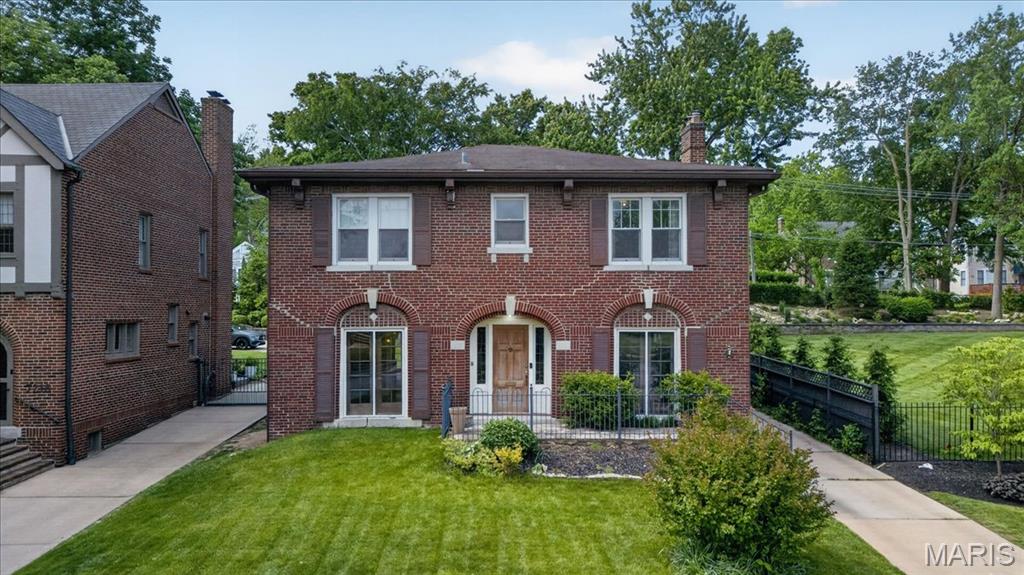 Bring your architect, your contractor, and your imagination! Situated in the heart of the highly coveted Maryland Terrace, this 2,216-square-foot brick home is awaiting a total transformation. This isn't just a renovation; it’s a chance to restore a piece of University City history and build instant equity in one of the region's most prestigious enclaves. Four spacious bedrooms and two bathrooms spread across a floor plan that is ready to be reimagined for modern living. Located on a quiet, tree-lined street with plenty of room for outdoor entertaining or a lush garden retreat. Maryland Terrace is more than just a subdivision; it’s a lifestyle. Known for its wide, spacious streets and quiet, friendly atmosphere, you are close to Clayton’s world-class dining options, Washington University and the eclectic culture of the Delmar Loop. NOTE: Homes in Maryland Terrace rarely come available at this price point. This property is being sold as-is, offering a blank slate for a high-end custom renovation. Whether you are looking to create your forever home or your next marquee project, the potential is unmatched.