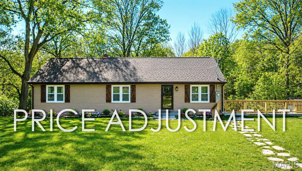 Price Drop, seller credit offered AND Open Sunday 1-3PM! What else could you ask for? COMPLETELY REBUILT! Rare opportunity - Beautifully rehabbed 3 bedroom ranch home with an exceptional location on over 2.8 acres including an attached two car garage, new roof, an outbuilding AND a huge brand new back deck with two sets of stairs. You will love the updated and thoughtful finishes throughout! New roof-windows-new electrical-new installation JUST to name a few . As you enter the inside, you'll be greeted by warm flooring, high ceilings and a great open flow. Stunning fireplace in the living room! Dining area has double doors to the back deck and also connects to the BEAUTIFUL, spacious kitchen with all brand new appliances featuring built-in microwave, hood and all Cafe appliances. Custom cabinetry and quartz countertops round up your kitchen area. Main floor primary bedroom has double doors, double closets and connects to the upstairs loft room - a great space which could be used as an office, playroom, dressing room or even as an additional sleeping room! Full bathroom has ample room for you and your family. Two sizable bedrooms and an additional half bath complete the main level. For more living space you could finish the lower level. This basement features a walkout and lots of storage space! Outside you'll find lots of gardening space, playground areas, lots of privacy and beautiful wooded views. Great backyard with endless options, add a pool/ hot tub or even an outdoor kitchen! Conveniently located between the 2,000 acre Creve Coeur Park & Lake and the very nice Maryland Heights Community Rec Center, AAA Parkway schools with McKelvey Elementary School, close to all shopping, restaurants and quick highway access! You do not want to miss it - this is a one of kind home. CALL NOW!