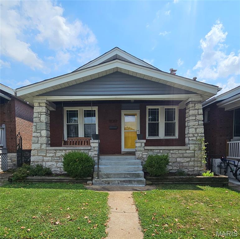 Classic brick bungalow nestled in the sought after Southampton neighborhood, where timeless character meets quality updates. This well maintained 2 bedroom 1 bath features hardwood floors throughout, fresh paint, decorative stained glass windows, updated windows, and a cozy wood burning fireplace. 
The updated kitchen offers newer appliances, a chef style range, ceramic tile backsplash, and plenty of workspace. The updated bathroom includes a convenient linen closet. 
Just off the kitchen, the inviting sitting room provides the perfect space for a home office, reading nook, or relaxing retreat and leads to the backyard deck overlooking the level yard.
The walkout lower level provides additional storage and flexibility, while the washer and dryer are included. A detached one car garage adds convenience. The newer HVAC system provides added peace of mind, and a full staircase leads to the spacious attic, offering potential for future living space.
The classic brick exterior, complemented by updated vinyl siding, enclosed soffits, fascia
and gutters, combines the timeless character of the neighborhood with low maintenance updates. 
Enjoy the walkable convenience, enduring character, and neighborhood pride that have made Southampton one of St, Louis' most sought after communities.