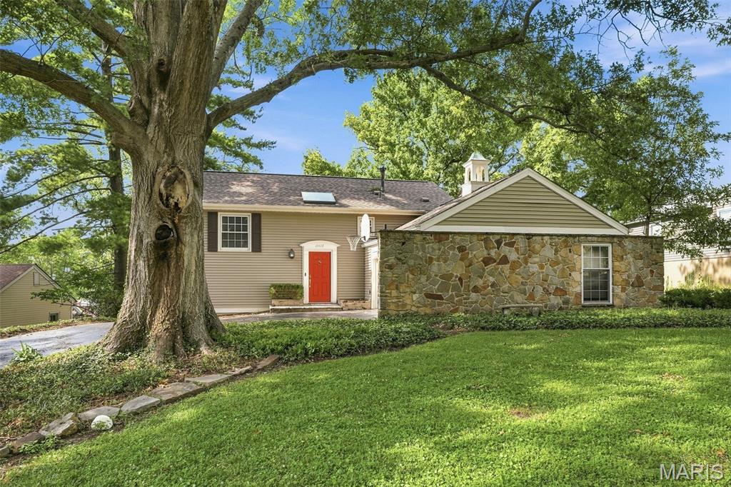 WELCOME HOME to this beautifully maintained, unique property. You are welcomed by a split level foyer, take a few steps down to the spacious living room with a wood burning fireplace and gleaming hard wood floors.  the well appointed kitchen leads through to the spacious dining room, ideal for family meals and hosting alike.  The expansive, light filled family room with french doors leading out to the patio and secluded backyard, made for entertaining. The upper level is where you will find four spacious bedrooms, the primary suite boasts 4 closets and a full bathroom, the window seat looks out over the back yard.  The remaining three bedrooms are generously proportioned. The large double garage rounds off this wonderful home, ready to welcome its new owners and make new memories. Washer and Dryer Stays.
