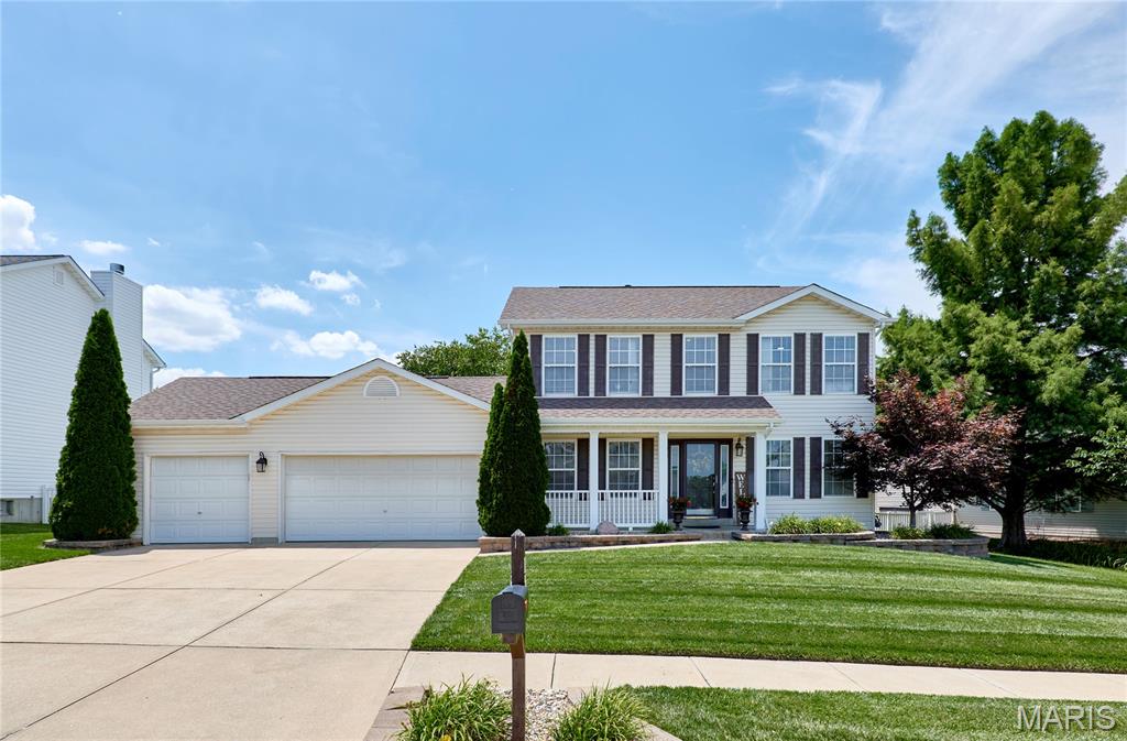 Entertainer’s dream home in the award-winning Fort Zumwalt School District! This stunning 2-story cul-de-sac residence is within walking distance of Westhoff Park, the Ozzie Smith Sports Complex, and CarShield Field, offering fast access to I-70 and premium shopping. The private backyard oasis steals the show, featuring a gorgeous 13k-gallon fiberglass kidney-shaped pool and expansive concrete patios. Inside, upgraded LVP flooring flows seamlessly through the foyer, a dedicated home office, and a formal dining room. The gourmet kitchen boasts a trendy backsplash, crown molding, and a center island, opening directly to a cozy family room anchored by a beautiful bay window and wood-burning fireplace. Upstairs, you'll find 4 spacious bedrooms, including a luxury primary suite complete with a walk-in closet, double vanity, separate soaking tub, and shower. The professionally finished  basement adds incredible value with complete in-law quarters, featuring a full kitchenette, living and dining areas, a legal bedroom with a walk-in closet, and a full bath. To top it all off, the home features a spacious 3-car garage. With extensive updates throughout, this move-in-ready gem truly has it all!