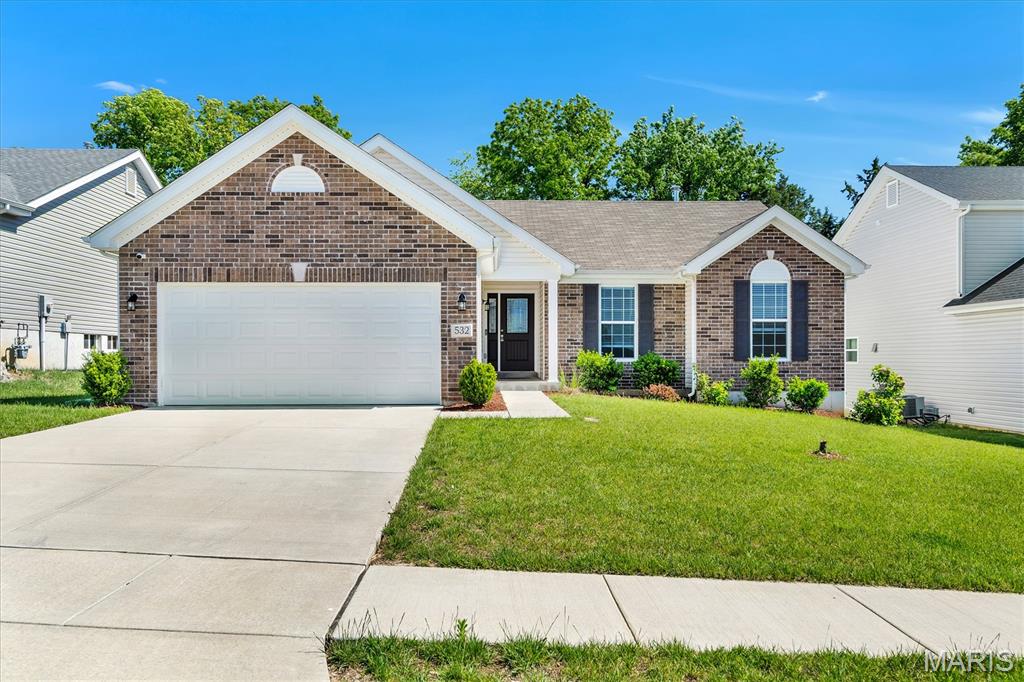 This McBride Homes’ Hickory ranch 3BR 2BA market home is move in ready! Open floor plan features gorgeous luxury vinyl flooring, stainless steel appliances, new carpet and fresh paint. Open kitchen layout with breakfast bar open to dining area, level 4 dark Flagstone kitchen cabinetry, and corner walk-in pantry. Main floor laundry. Master suite features a large walk-in closet and an upgraded master bath with adult height double vanity, large tub with window, walk-in shower, and linen closet. Half wall at stairway to basement. Upgraded lighting, plumbing fixtures, six panel doors, and more! Lexington features a playground, sports court, pavilion with BBQ area and picnic tables! Easy access to Hwy 61, I-70, 40 and Wentzville Parkway! Enjoy peace of mind with McBride Homes' 10 year builders warranty.