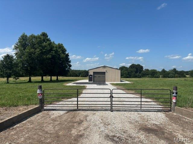 Mark Twain Lake/Santa Fe/Monroe County
Imagine your own 8 acres, your own Lake Retreat, weekend getaway or Investment goal. 
A 30' x 47' metal building awaiting your desires.  One overhead door, 2 walkout doors, bathroom in place, heated concrete floors, and floor drain.   Located in the Mark Twain Lake Southfork, Santa Fe area, on hard surface Route D.
8.69 surveyed acres of cleared and clean land with boundary trees and a few spots of clustered trees. 
Dare to dream of your own barndominium, your own hobby shop, your own mini farm, your own boat storage, your own RV area/park. Your own DREAM!
Gated and ready for your new adventure!
Interior of building awaiting you plan of use!
See it! Love it! Own it!