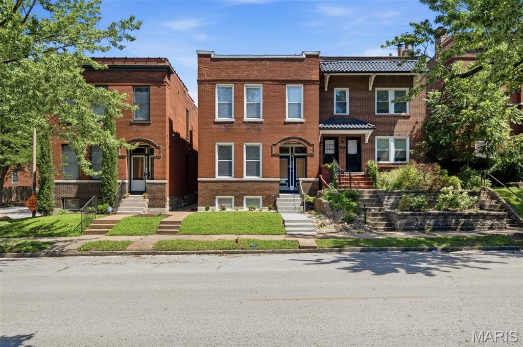 289 acres of Tower Grove Park practically at your front door! Welcome to 3423 Magnolia Ave, a beautifully maintained 4-bedroom home in the heart of Tower Grove East; one of St. Louis City's most walkable and sought-after neighborhoods. 
Gorgeous wood floors and an open floor plan greet you the moment you step inside, flowing into a spacious kitchen and sitting room made for gathering. Main level laundry? Check. Storage galore? Check. Upstairs you'll find four generously sized bedrooms, including a true primary suite with a walk-in closet, en suite bath with double sinks, and your own private balcony.....morning coffee just got an upgrade. 
Out back, the yard is the perfect low-maintenance size for entertaining, plus TWO off-street parking spots so street parking is never your problem. Just blocks away, Tower Grove Park delivers the weekly farmers market, Food Truck Fridays, and 289 acres of trails, pavilions, and green space year-round. Homes like this in Tower Grove East don't wait around — come see it at the open house Friday, 1–3 PM, before someone else falls in love first.