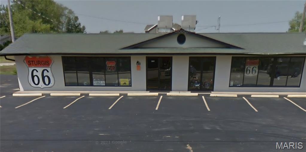 Prime commercial opportunity in the heart of Downtown O'Fallon! Boasting approximately 256 feet of highly visible frontage along North Main Street, this property offers exceptional exposure and outstanding redevelopment or owner-user potential.
Property features over 2,400 square feet of commercial space and includes the adjoining large lot (currently used car lot) providing additional parking, expansion possibilities, or future development opportunities.
The building is currently occupied by Sturgis 66 and Golden Cars; however, both tenants will vacate prior to closing, allowing for immediate owner occupancy or new leasing opportunities.
Significant improvements include a new roof installed in 2024, along with updated electrical and plumbing systems completed in 2015.
Ideal for a variety of other commercial uses in this high-traffic Downtown location. Lease may also be considered.
Owner is a licensed real estate broker in the State of Missouri.