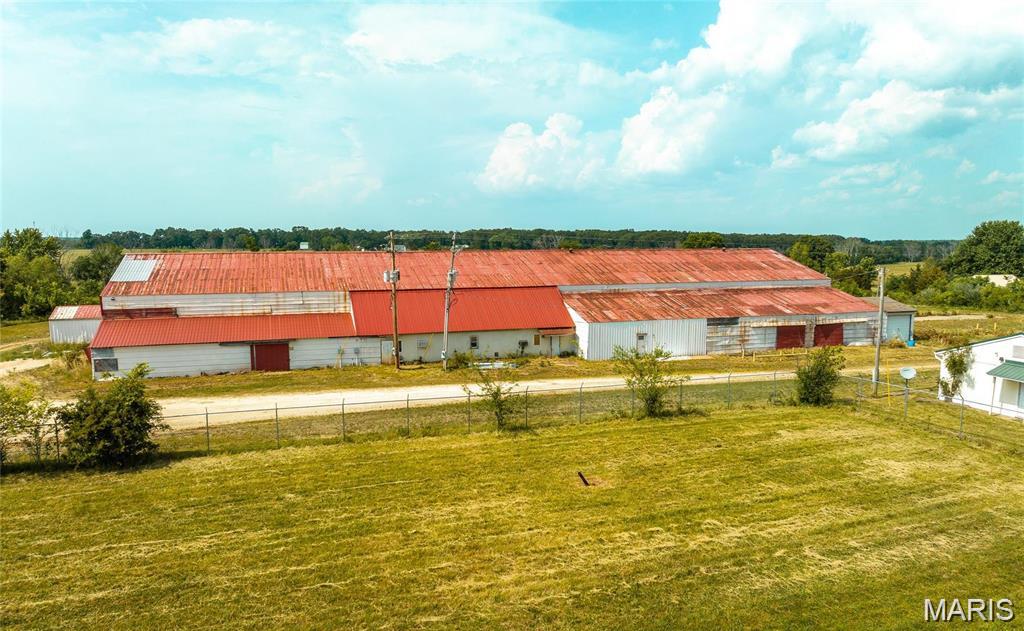 MANY POTENTIAL USES!! THE MAIN WEARHOUSE/FACTORY BUILDING HAS OVER 22,000 SQ FT (M/L). ITS LOCATED ON 8.3 M/L ACRES. THERE IS A SEPARATE STORAGE BUILDING WITH 2 OVERHEAD DOORS. THIS PROPERTY ALSO FEATURES A BUILDING THAT CAN BE USED FOR OFFICES OR EVEN A HOME. 
CALL TODAY TO SCHEDULE YOUR PRIVATE SHOWING! Location: Industrial Area, Rural