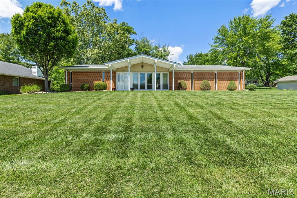Enjoy easy, single-level living in this well-maintained 1,906 sq ft ranch at 32 Normandy Drive. Featuring 3 bedrooms and 2 full bathrooms, the home offers a functional layout with comfortable living spaces and abundant natural light. Ideally located across from Lake St. Louise, you’ll appreciate scenic lake views and the convenience of being within walking distance to the Brittany Cove Boat Launch and community association park.
Set on a large, level lot with mature trees and well-kept landscaping, the property provides a peaceful outdoor setting. An oversized side-entry garage offers ample parking and storage, while the sunroom is perfect for relaxing year-round. Enjoy access to Lake St. Louis Community Association amenities, including lakes, parks, and recreational facilities. 
A wonderful opportunity to enjoy comfort, location, and lifestyle in one.