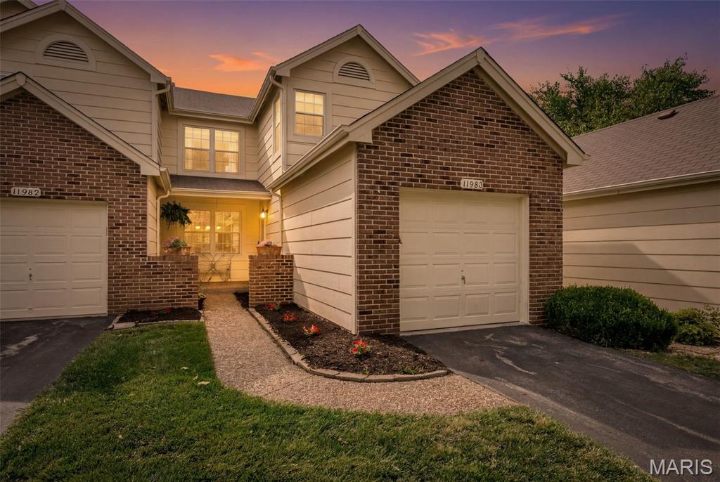 Welcome to Autumn Lakes, one of Maryland Heights' most sought-after residential communities where low-maintenance living meets an incredibly full lifestyle. This 3-bedroom, 2 full and 2 half bath home offers nearly 2,000 square feet of thoughtfully used space, including a finished walk-out lower level that works beautifully as the third bedroom or a generous rec room, complete with its own private patio.

The layout is smart and livable. A cozy front porch entry welcomes you in, and the main level opens to a deck high enough to feel nestled in the treetops, perfect for morning coffee, a good book, or overflow entertaining. Upstairs, the primary suite includes a dedicated bonus room ideal as a home office, library, or nursery. Built-ins add warmth and function throughout, and the one-car garage rounds out the practicality.

What truly sets this home apart is everything the HOA handles for you: roof, gutters, siding, driveway maintenance and replacement, plus snow and leaf removal, water, sewer, and trash are all covered. Beyond your front door, the community delivers a pool, hot tub, clubhouse, tennis and pickleball courts, basketball court, stocked fishing ponds, RV and boat storage, and 44+ acres of lush common ground with lakeside green space for picnics and evening walks. A social calendar that brings the community together throughout the year keeps neighbors genuinely connected.

This is an owner-occupied community, which means your neighbors are invested in making it a great place to live. Tucked into Maryland Heights with quick access to both I-70 and I-270, shopping, dining, and everyday conveniences are all within minutes. An exceptional fit for first-time buyers, busy professionals, or anyone ready to trade the upkeep for the good life!